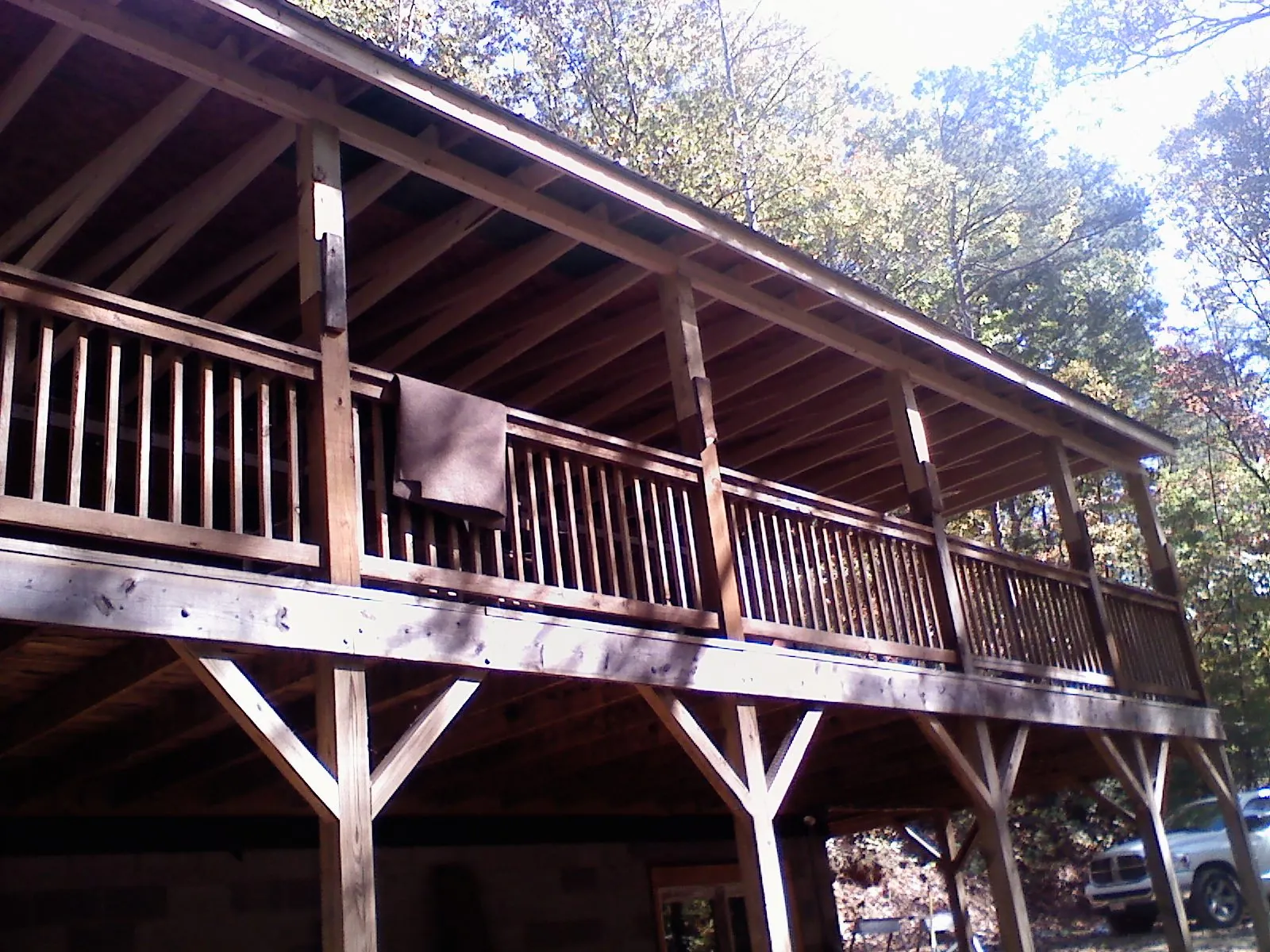 Timber framing under a new elevated porch and deck — Roof Leak Repair in Chesterville by Roofing Brothers